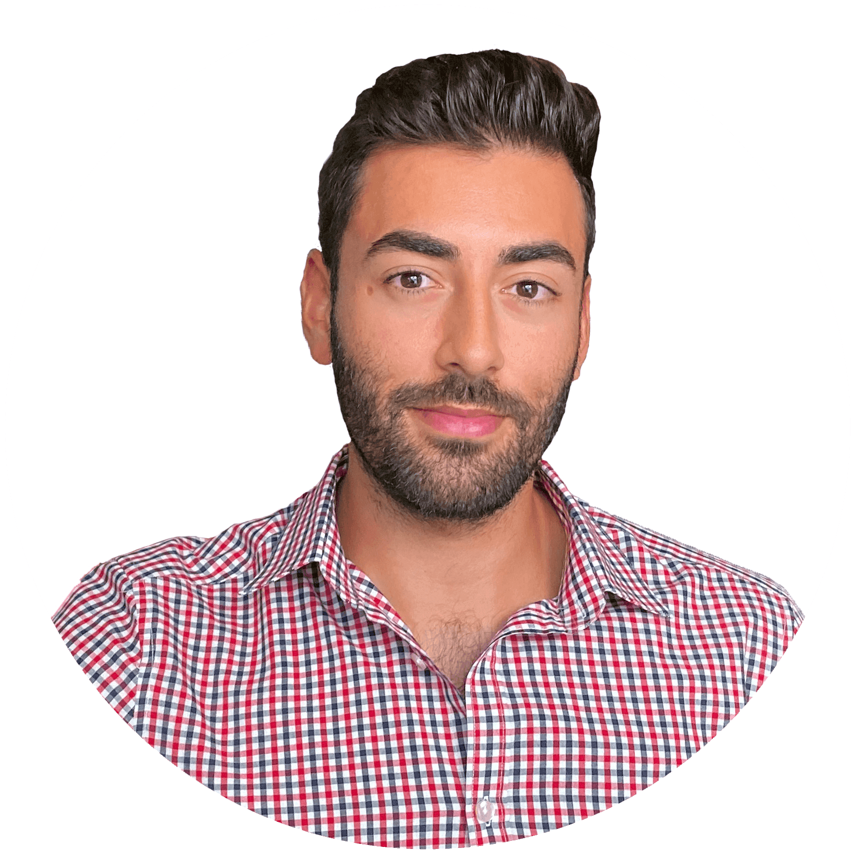 Man with dark hair and beard wearing a red and blue checkered shirt against a white background.